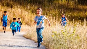 young kids running in a race