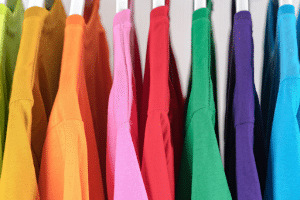 colorful tshirts hanging up